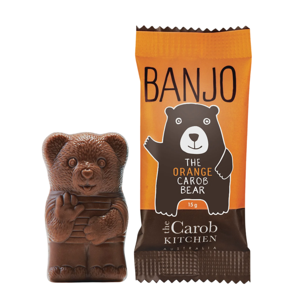 Chocolate bear with orange carob bear packaging featuring 'Banjo' and 'The Carob Kitchen' branding.
